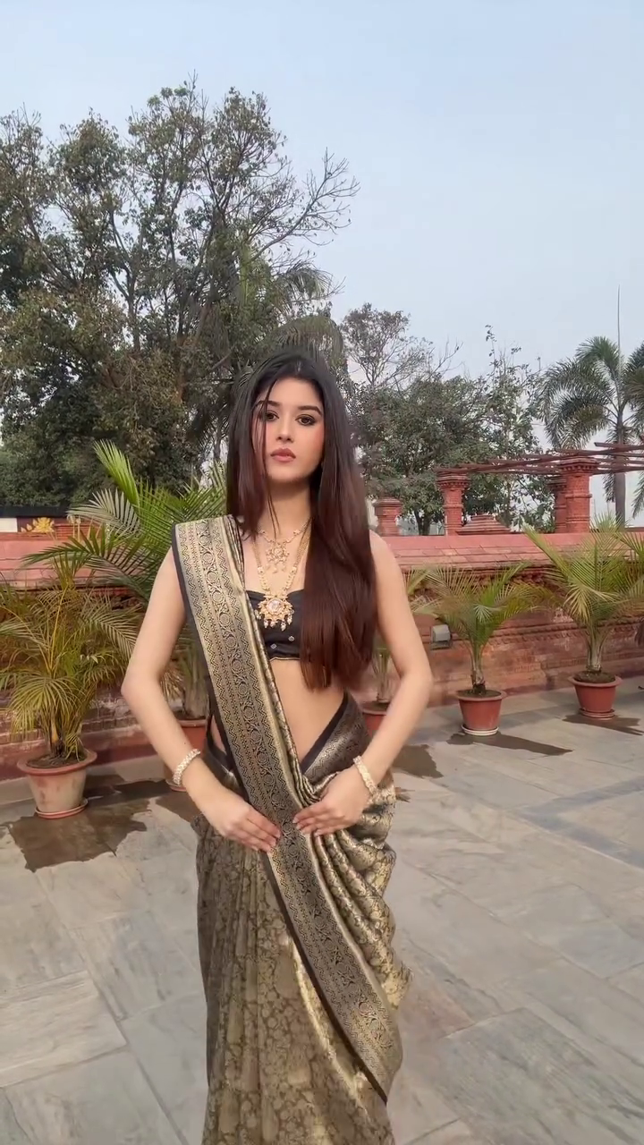 Chic Black and Gold Saree with Modern Ethnic Style